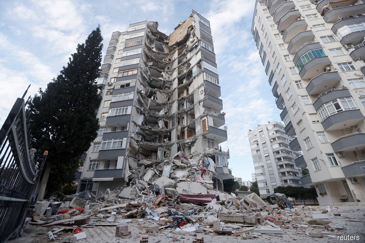 A semi-collapsed building following the earthquake in Adana, Türkiye on Tuesday (Feb 7).